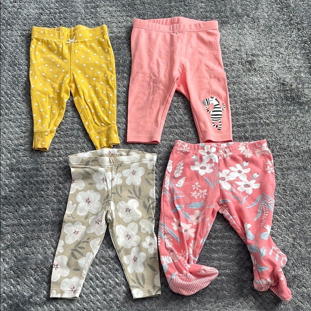 Set of 4 Baby Leggings in Pink, Yellow, and Floral Patterns 3-6months